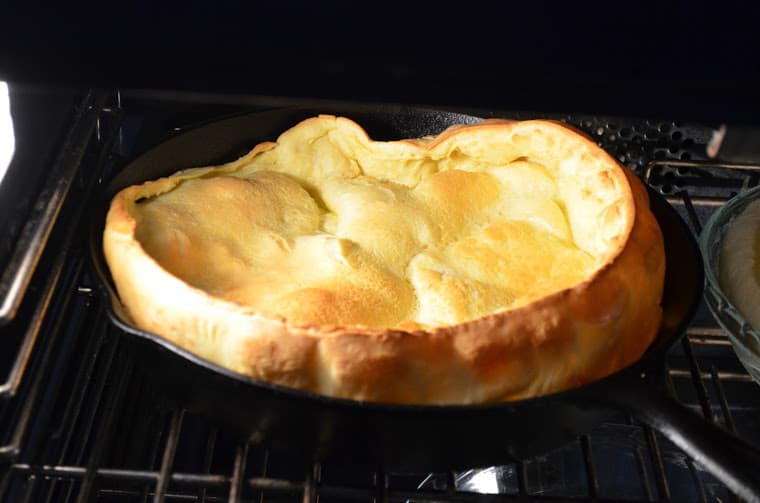 dutch baby pancake puffed up in the oven