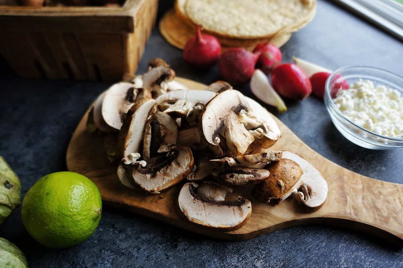 sliced portobello mushrooms on a cutting board