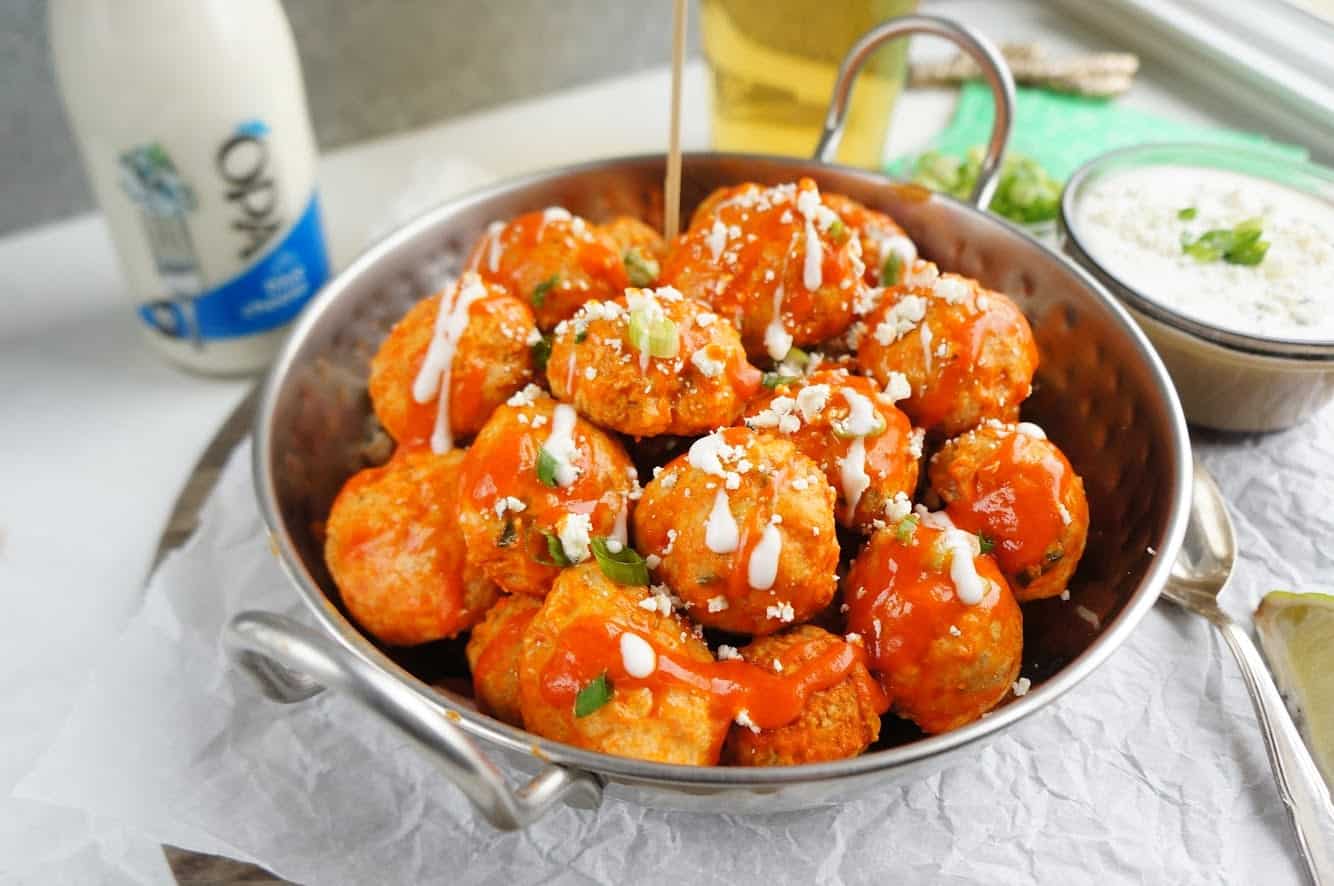 buffalo chicken meatballs in serving dish 