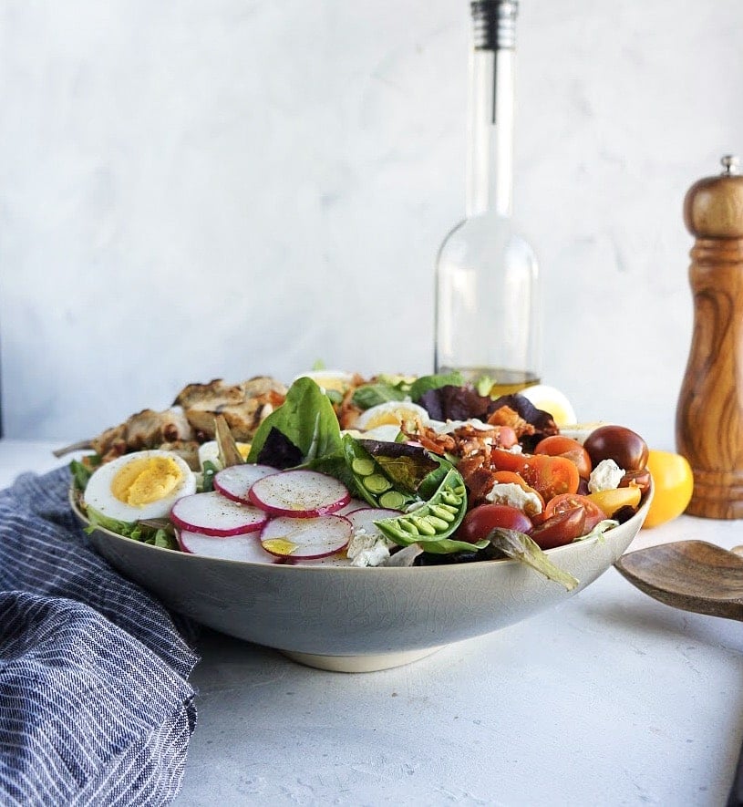 side shot of cobb salad with Avocado Vinaigrette 