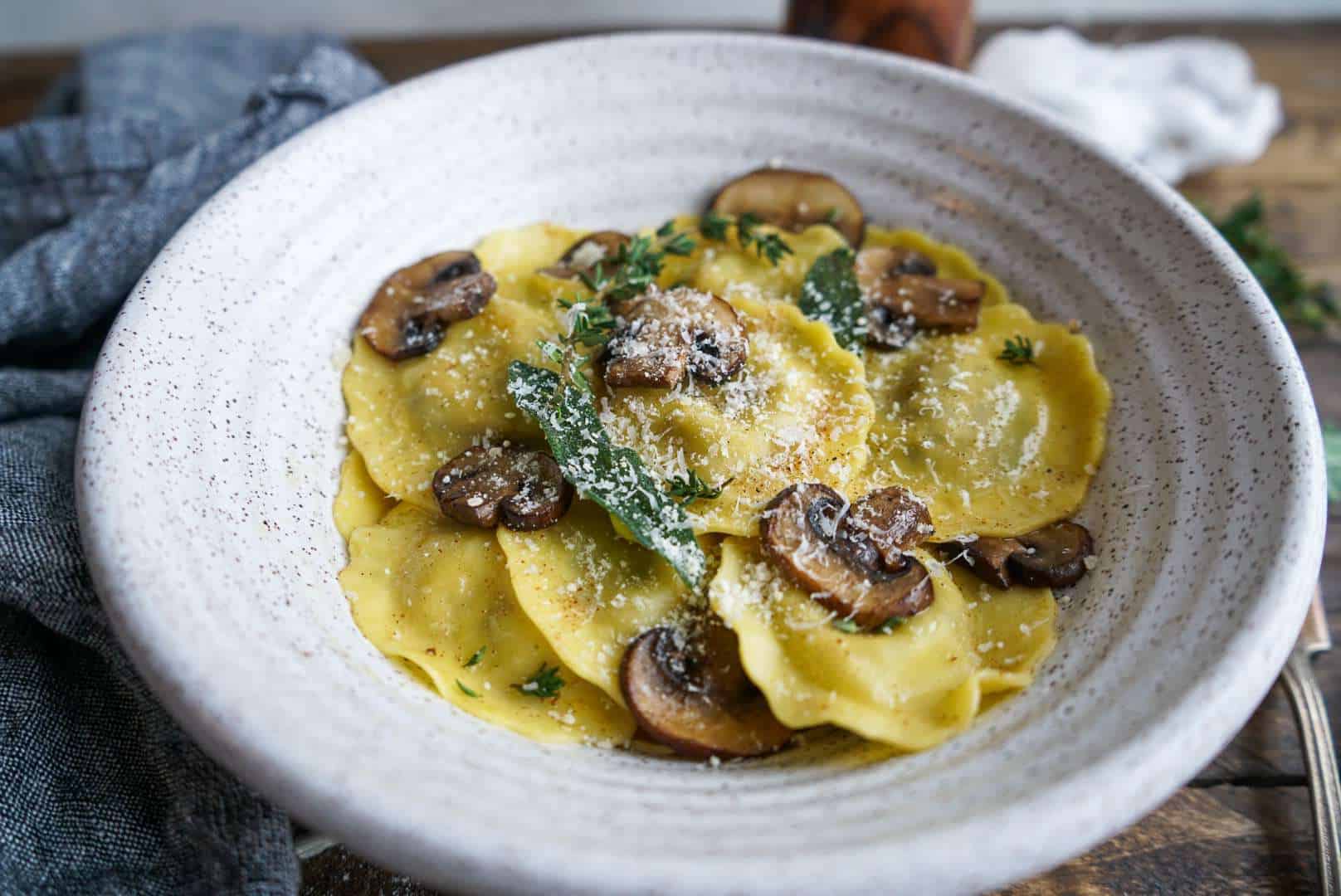 Mushroom Ravioli with Brown Butter Sauce with fresh parmesan 