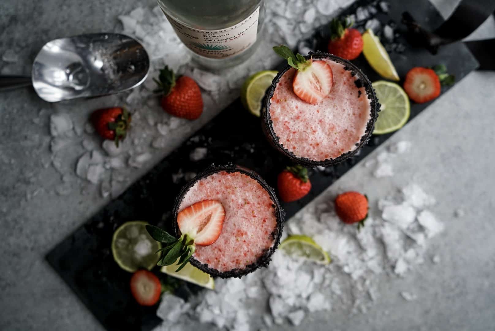 Strawberry Lime Margaritas on serving plate garnished with fresh strawberries