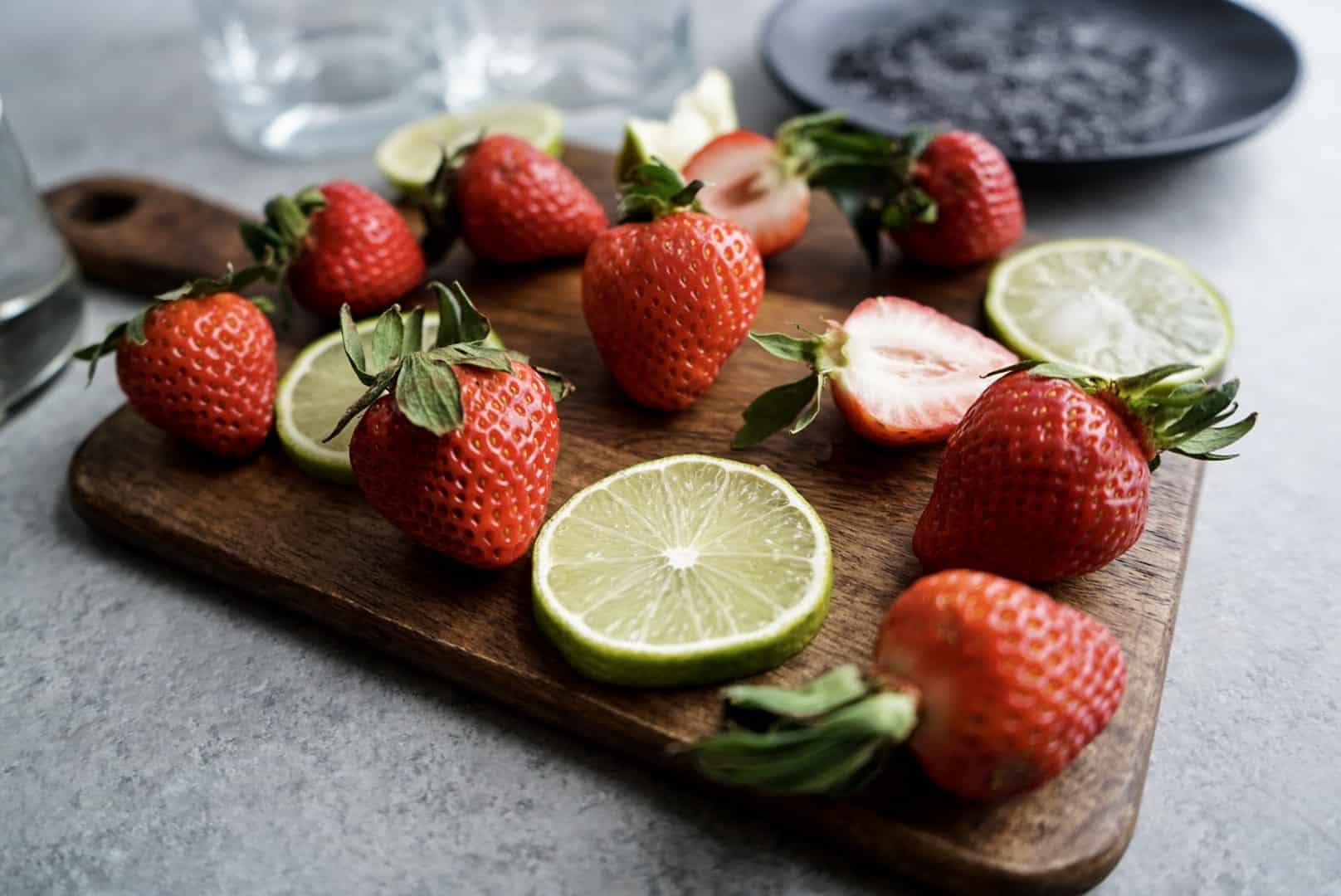 fresh strawberries and limes