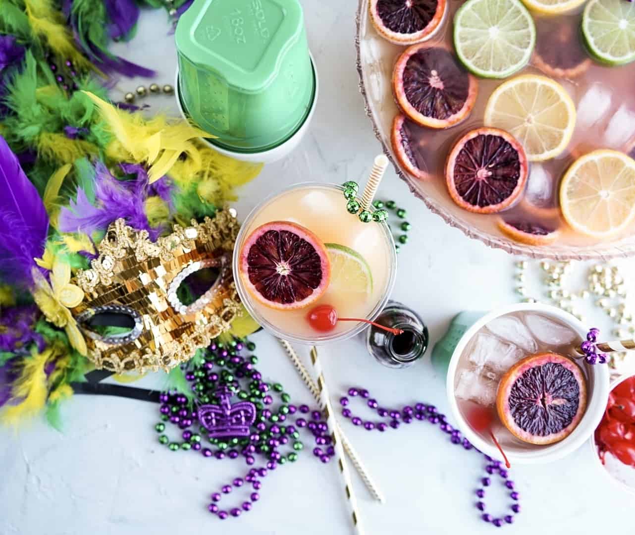 Hurricane Punch in cup with mardi gras mask and beads