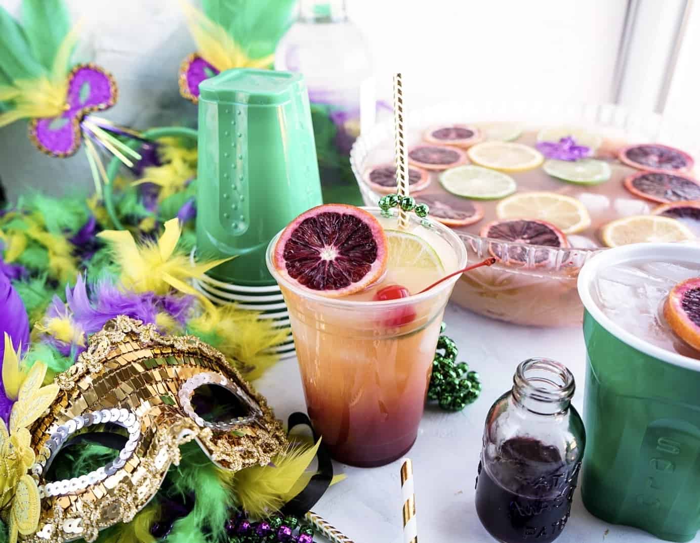 Hurricane Punch bowl with mardi gras decor surrounding