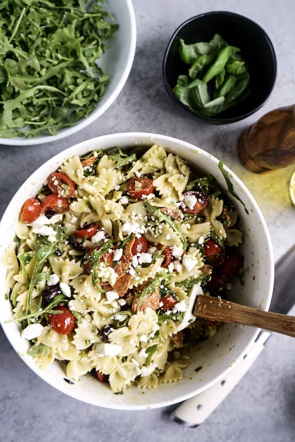 Easy Italian Pesto Pasta Salad mixed in bowl