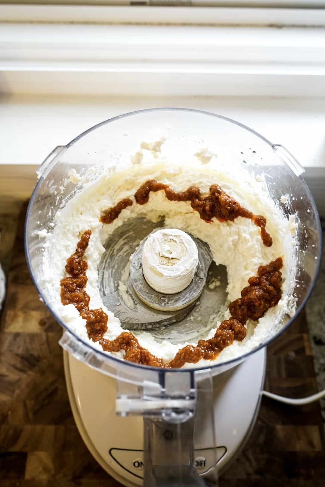 whipped feta dip with sun dried tomato in food processor