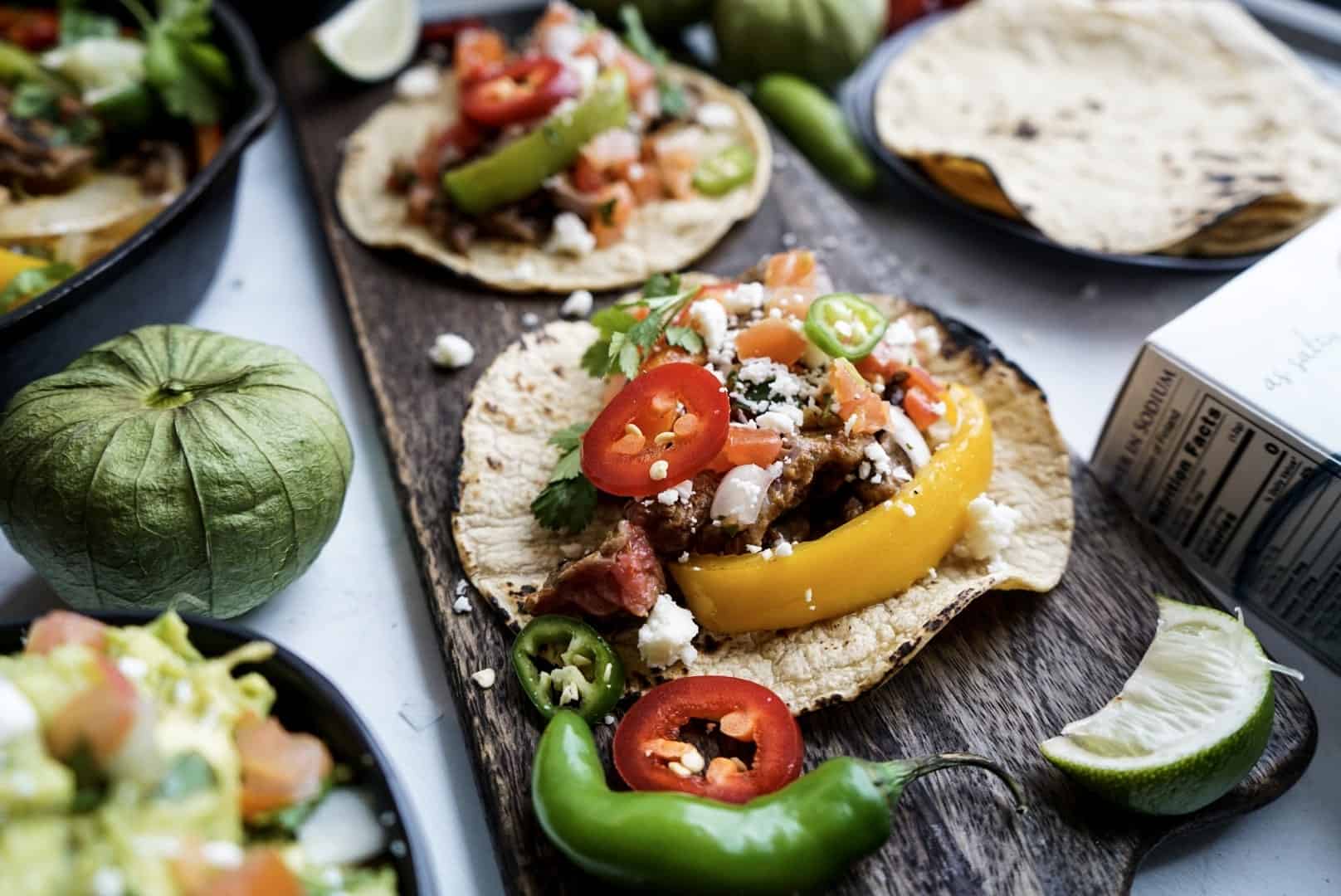 steak fajitas assembled with tortillas