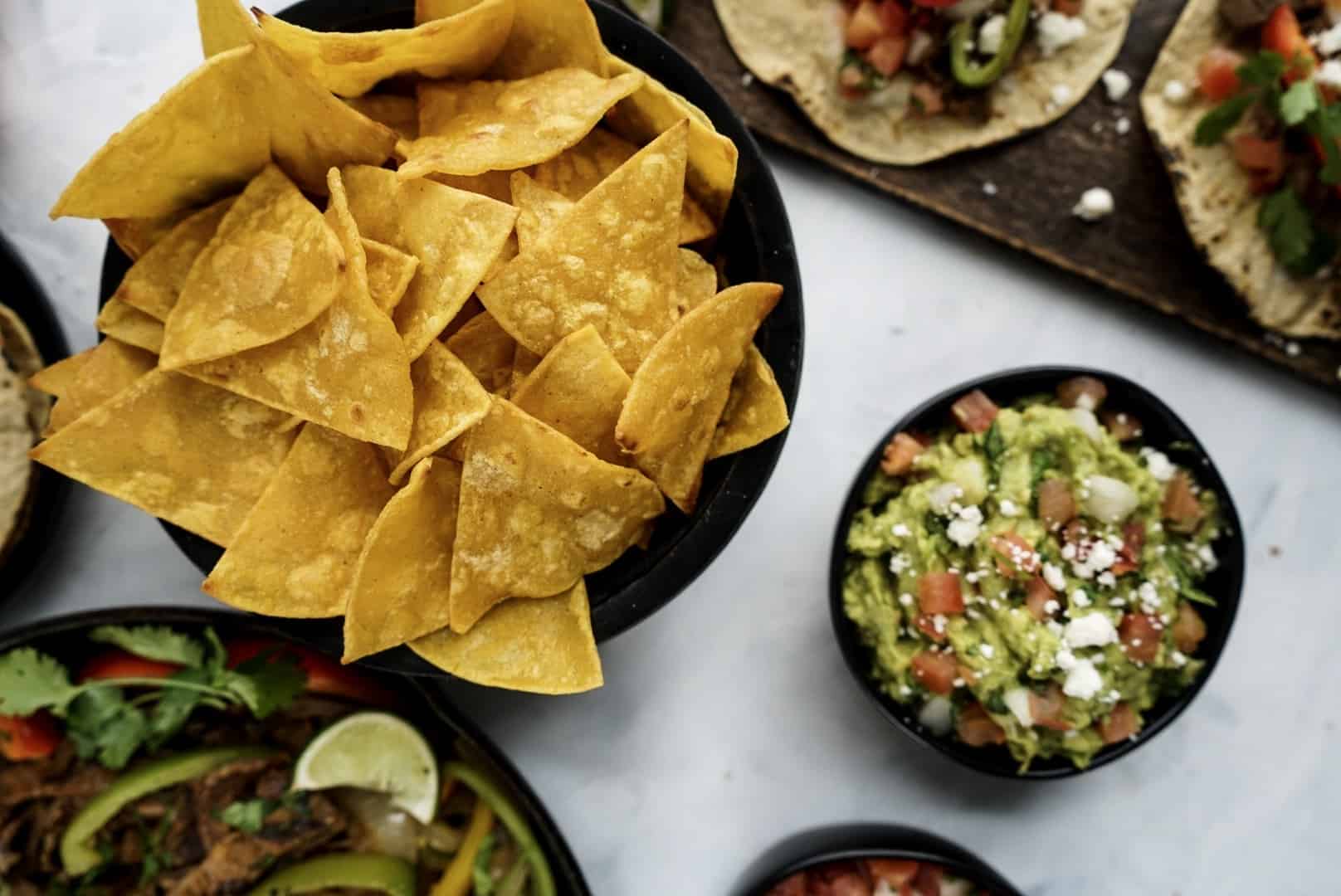 homemade tortilla chips with guacamole