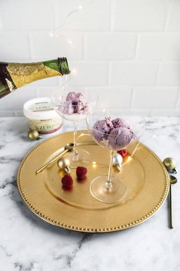 pouring champagne in glass with ice cream 