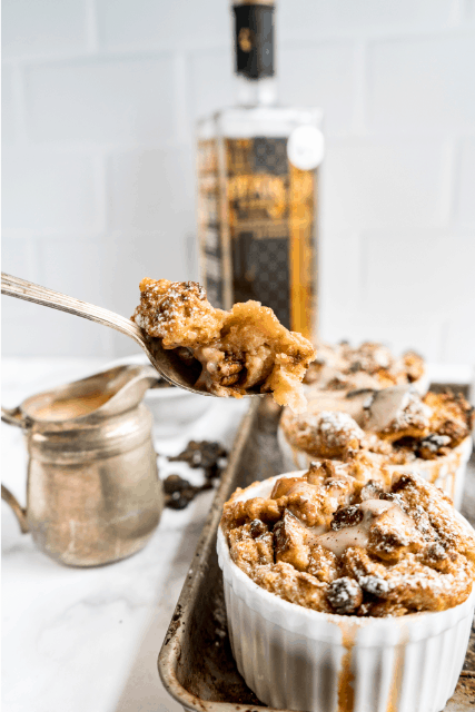 bourbon bread pudding with spoonful of bread pudding scooped out