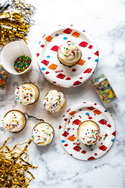 new year's eve confetti cupcakes on plates