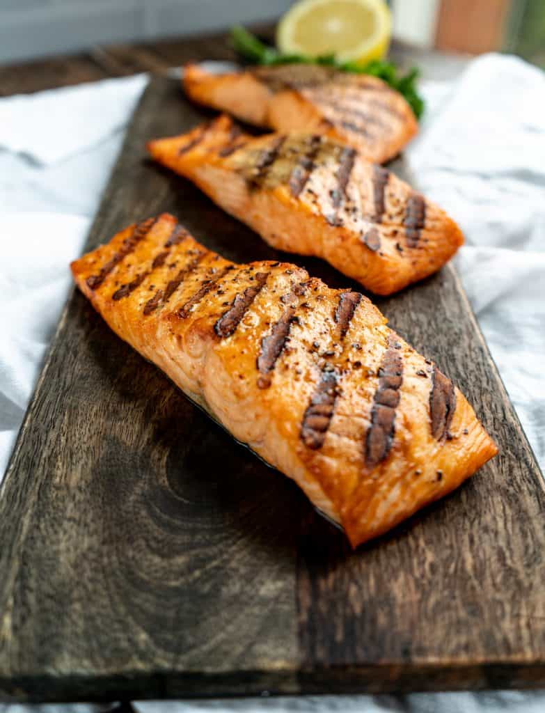 grilled salmon on wood plank