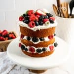 lemon berry layer cake on stand