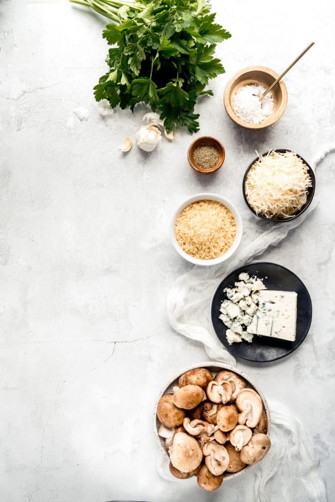 Instant pot Mushroom Gorgonzola risotto ingredients in bowls on background