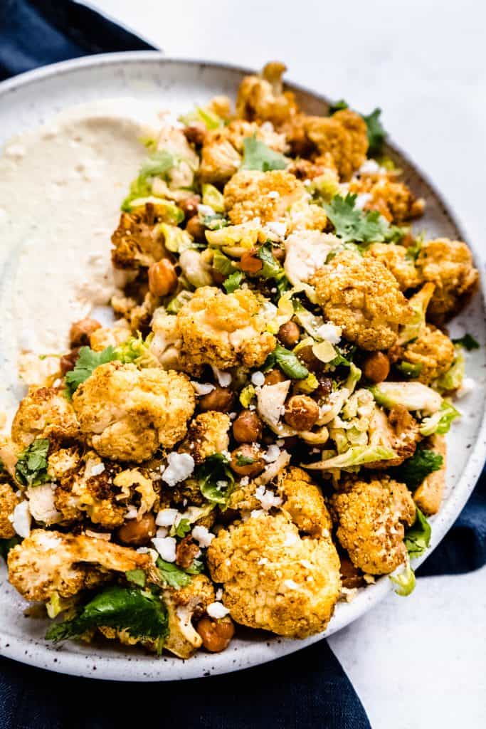 side close up shot of curried cauliflower and chickpea salad