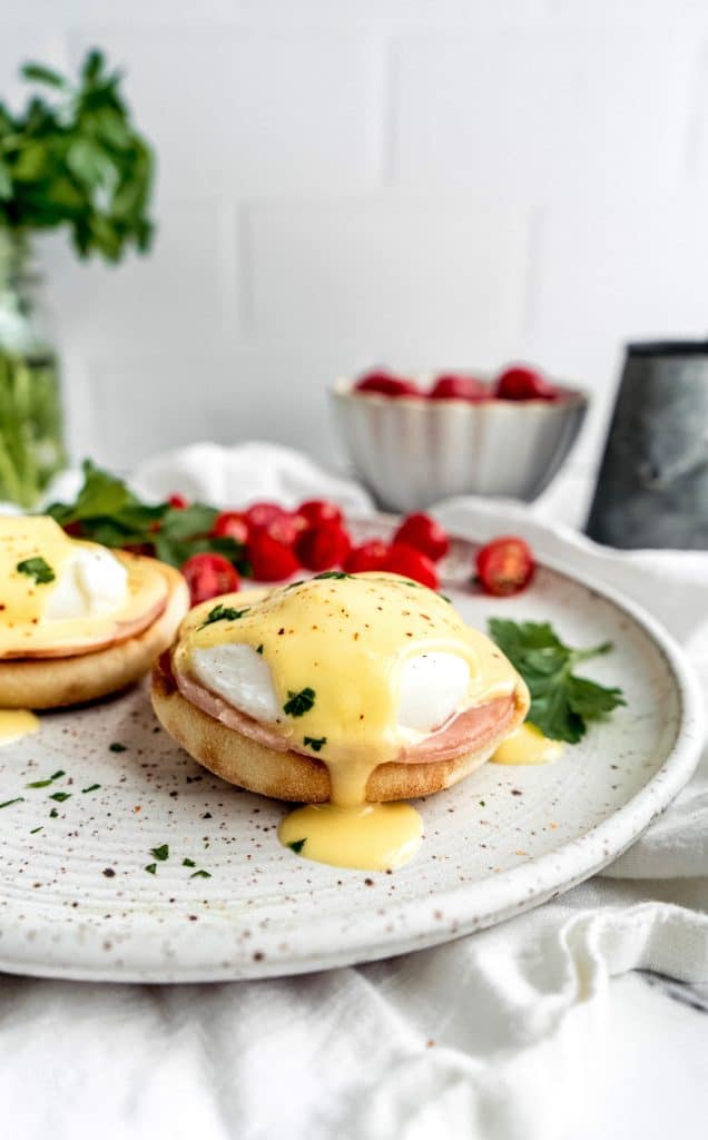 eggs benedict with citrus hollandaise on plate 