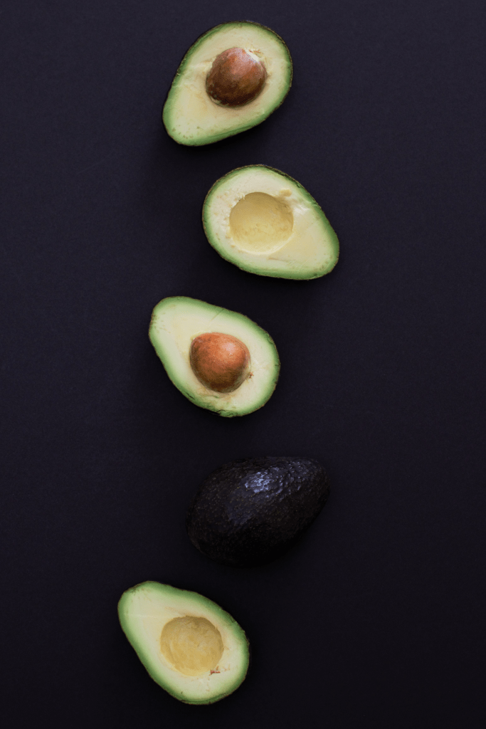avocado halves in a vertical line