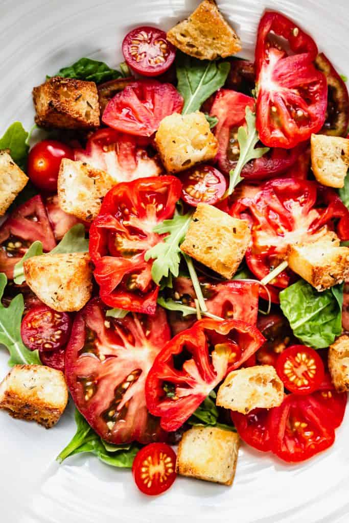 close up shot of panzanella salad in serving bowl