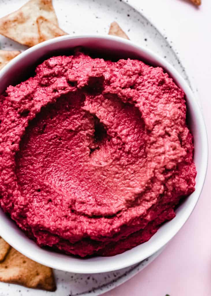 beet hummus in a bowl 