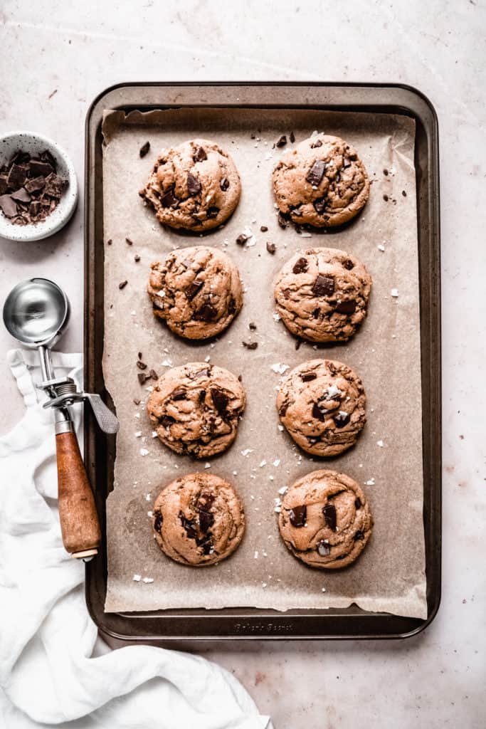 brown butter toffee chocolate chunk cookies baked on baking sheet