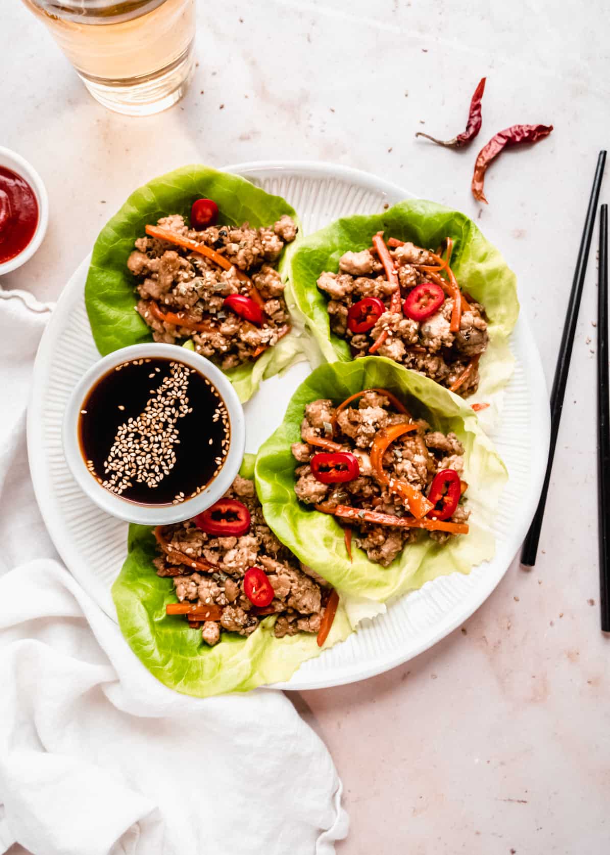 copycat pf changs lettuce wraps on plate with soy sauce