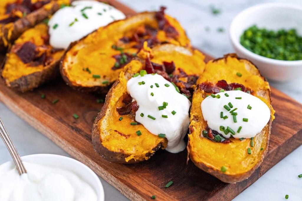 crispy loaded potato skins with sour cream and chives